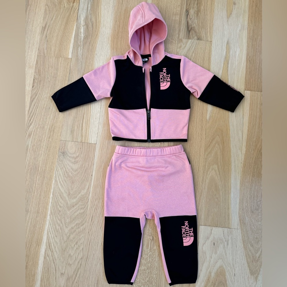 Brand new never worn size 6-12 months baby north face set. No tags.